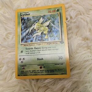 Scyther Pokémon Card with Yellow Border